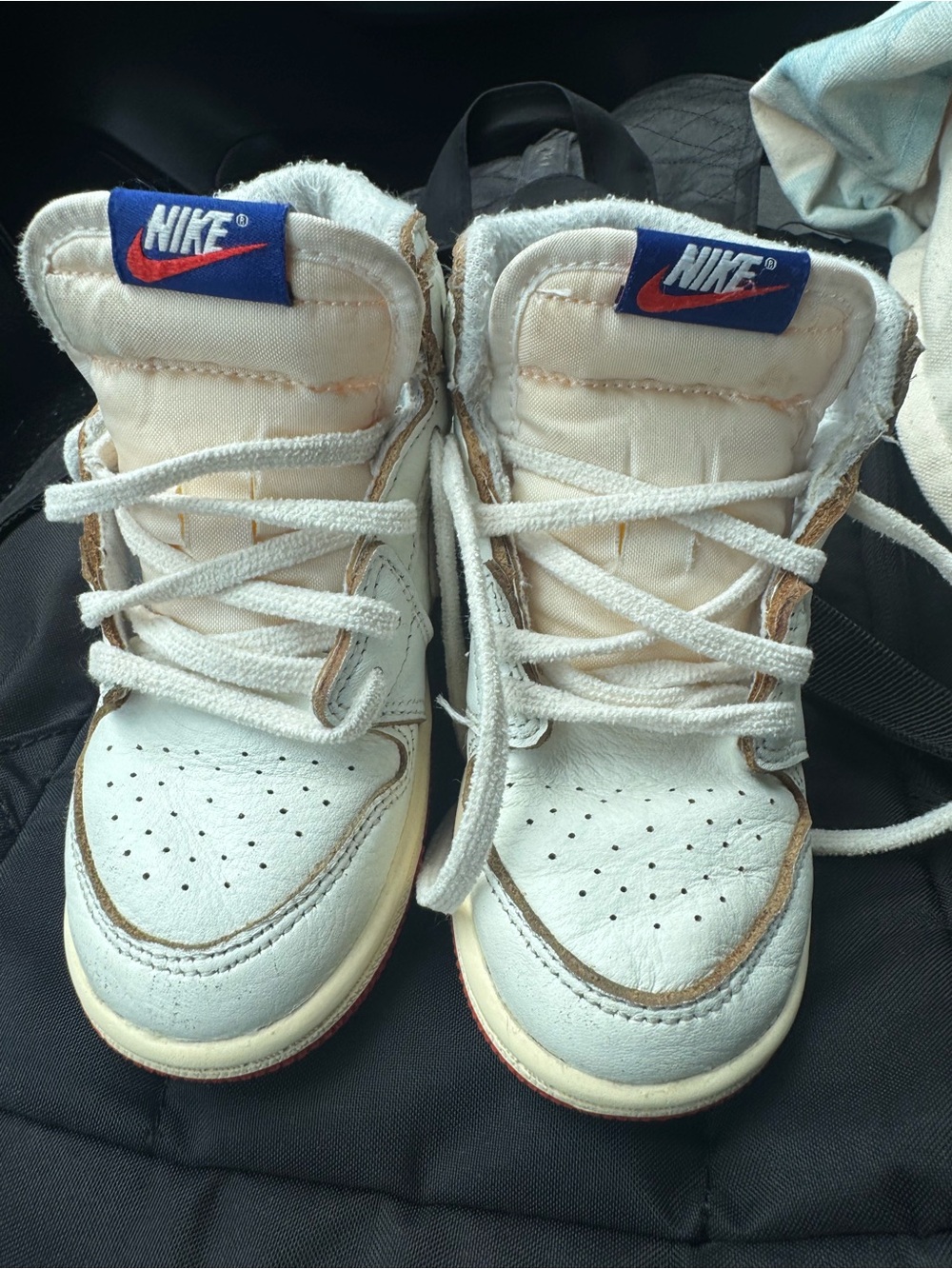 Air Jordan Kids Cream-White High Top Sneakers with Navy and Red Logo